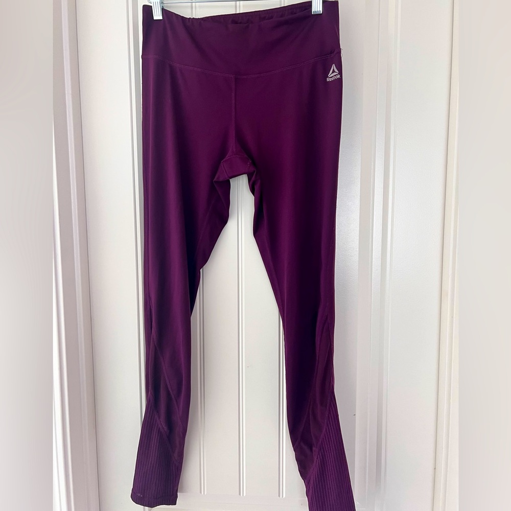 Purple reebok leggings with mesh details